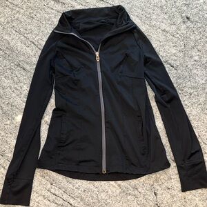 Under armour black zip up sweatshirt. Size: Medium. Good condition.